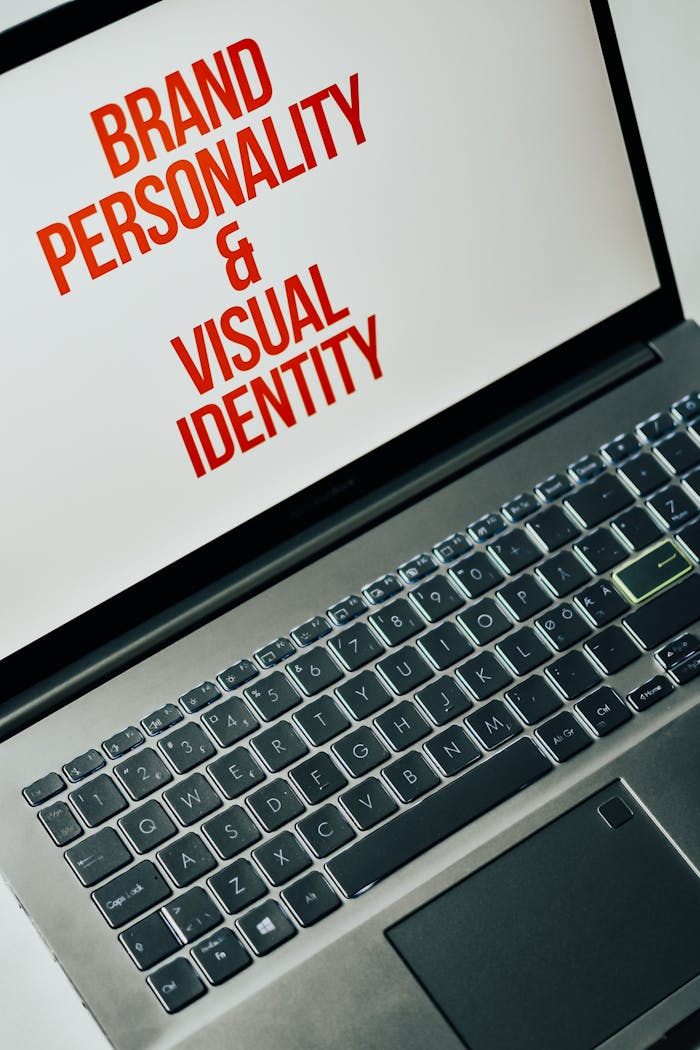 gallery-2 Laptop screen showing text on brand personality and visual identity for marketing strategy.