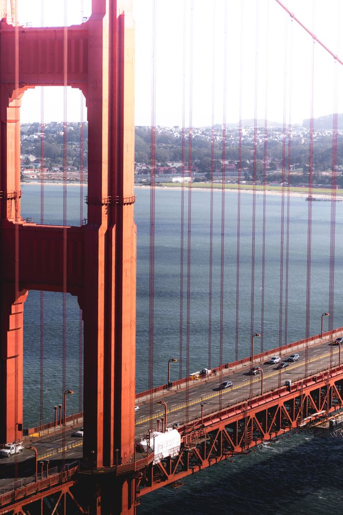 Stunning aerial view of the iconic Golden Gate Bridge in San Francisco on a sunny day.